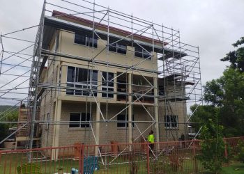 Hire Scaffolding Brisbane - scaffolding around tall residential building